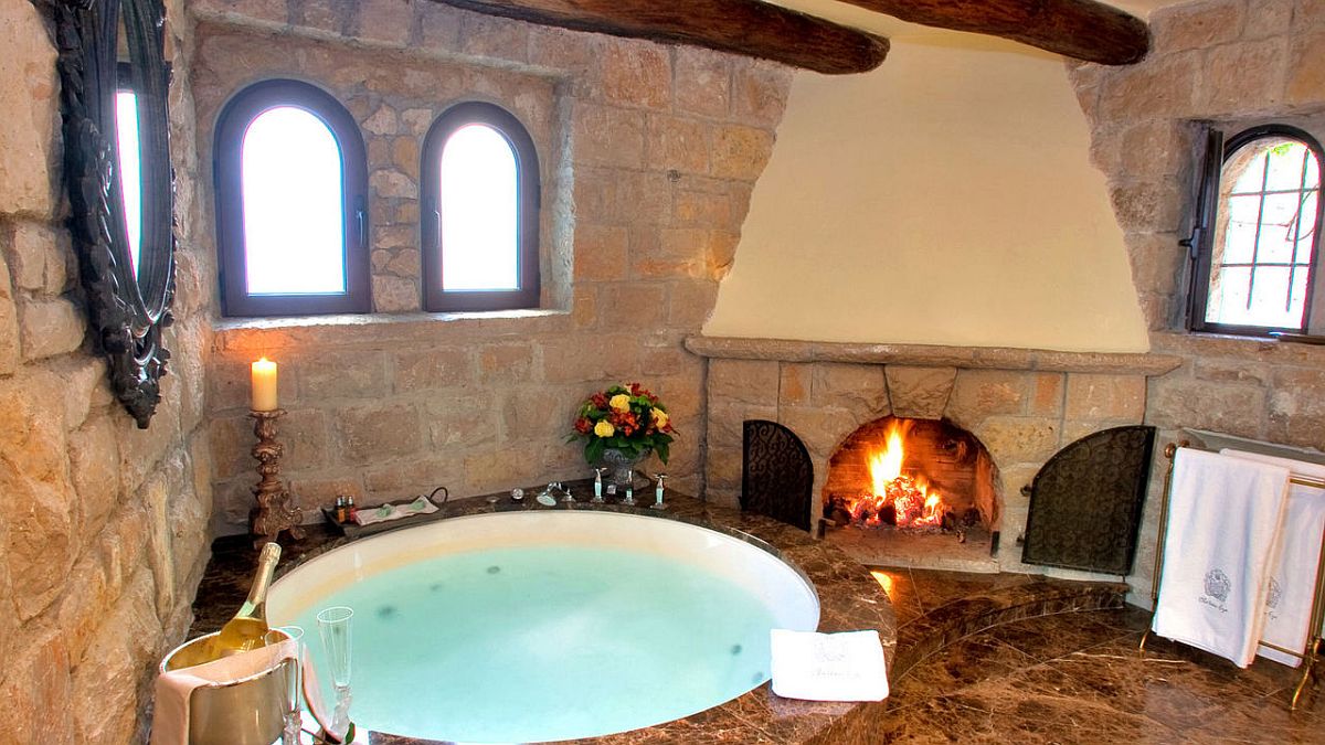 Jacuzzi and fireplace at the Chateau Eza