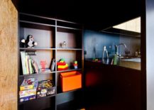 Kid-friendly-apartment-design-with-hidden-storage-for-toys-217x155
