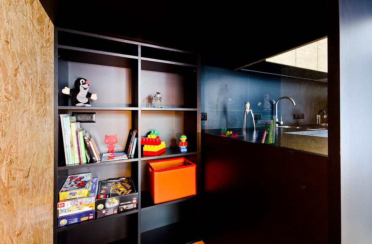 Kid-friendly apartment design with hidden storage for toys