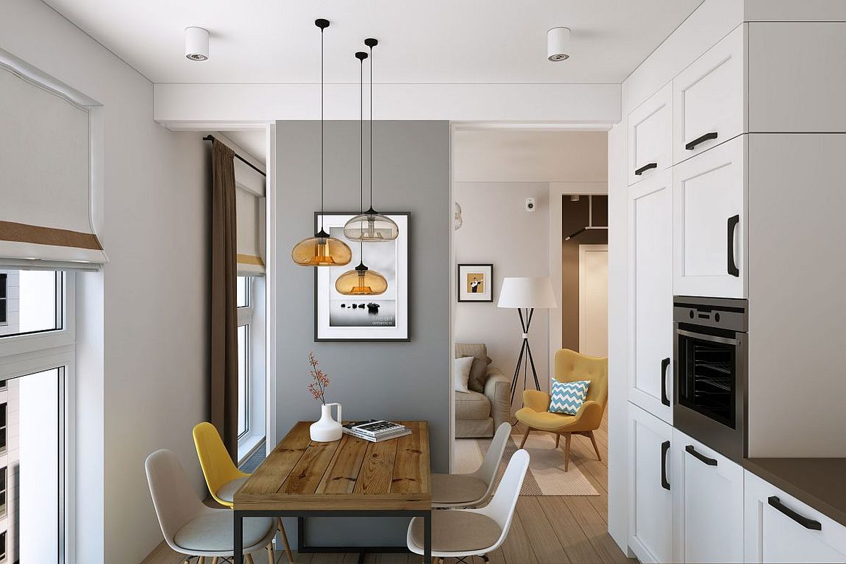 Kitchen and dining in white and gray with beautiful pendant lighting