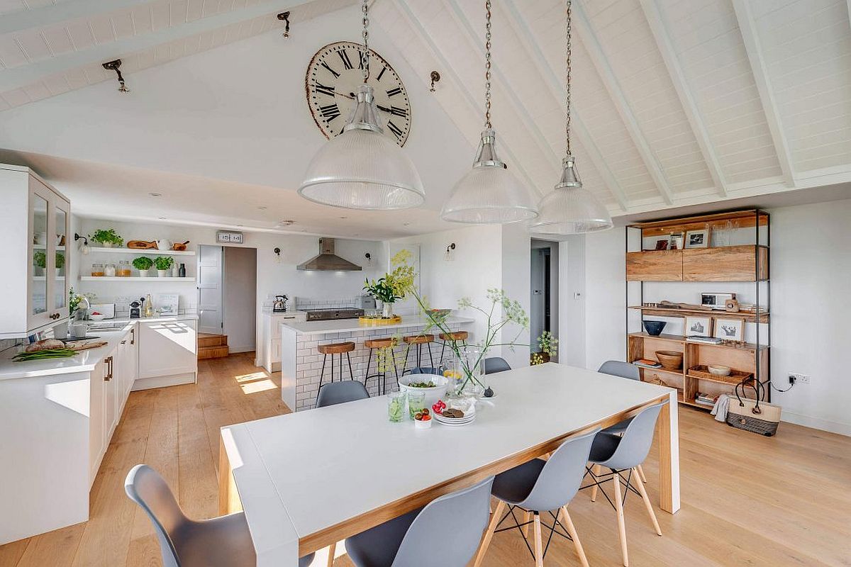 Large clock adds to the coastal style of the fabulous interior in white