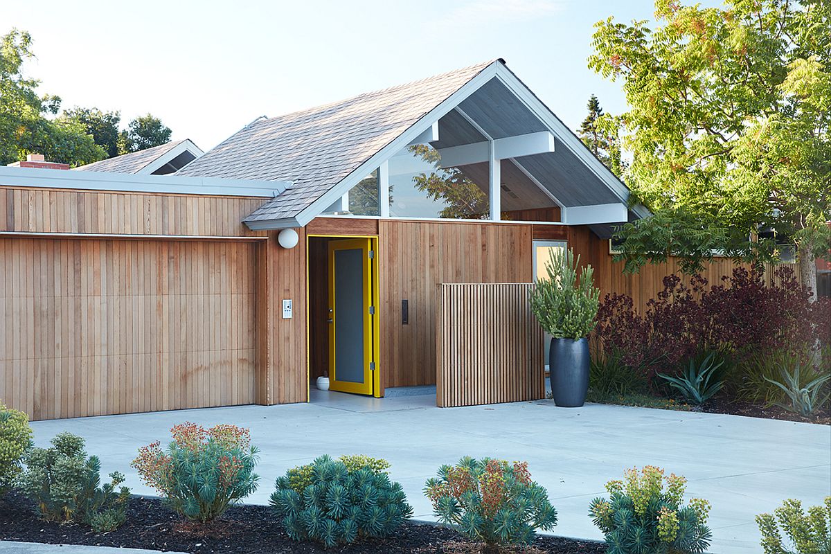 Modern Eichler home remodel clad in wood and glass