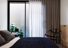 Modern-bedroom-with-a-series-of-drapes-and-sheers-217x155