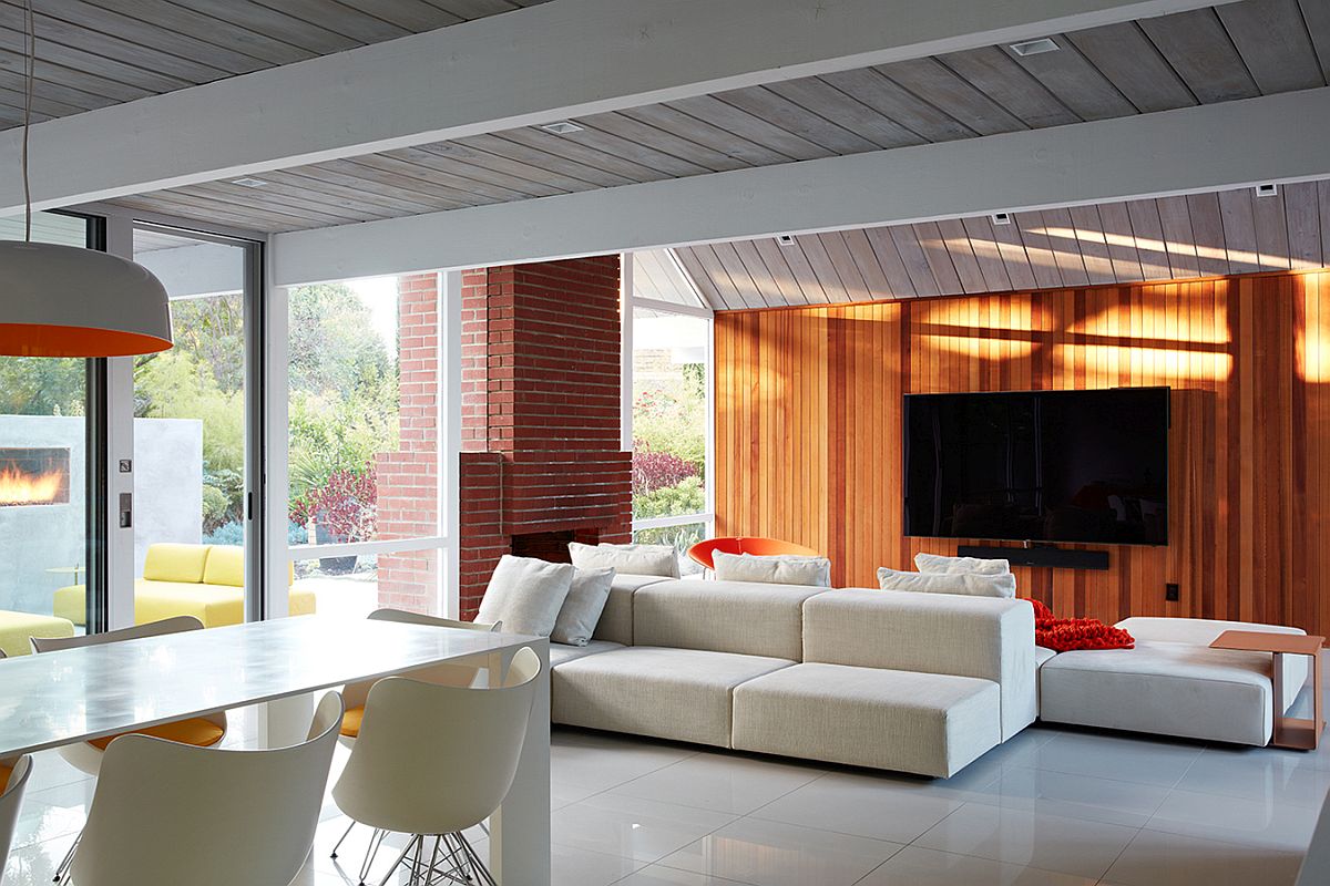 Modern living room with wood siding and a breezy ambiance