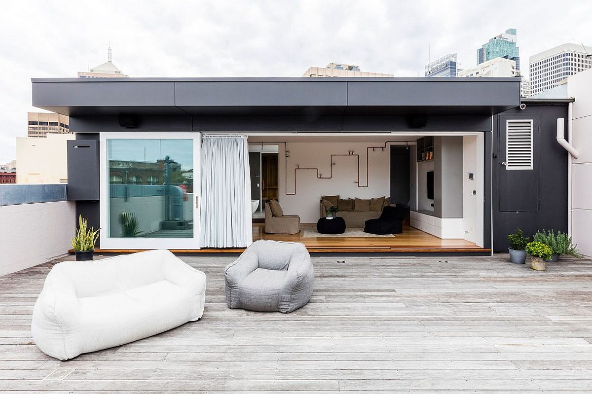 Modern minimal deck of the revamped Aussie apartment