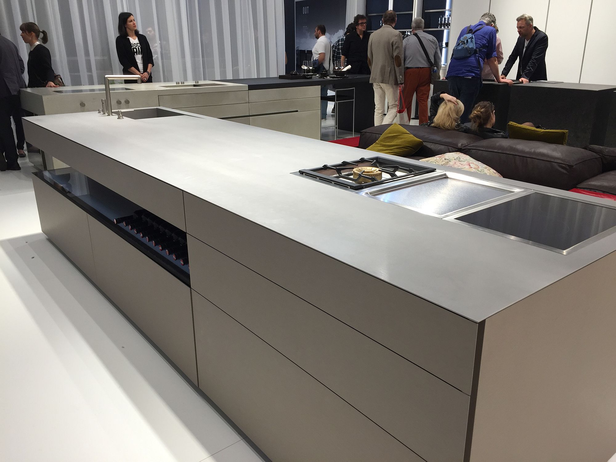 Stunning kitchen island with closed cabinets and open shelves from Steininger