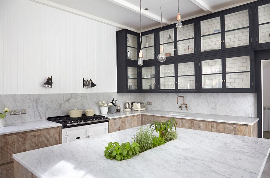 Unique kitchen island with marble top and a herb garden! [Design: Blakes London]