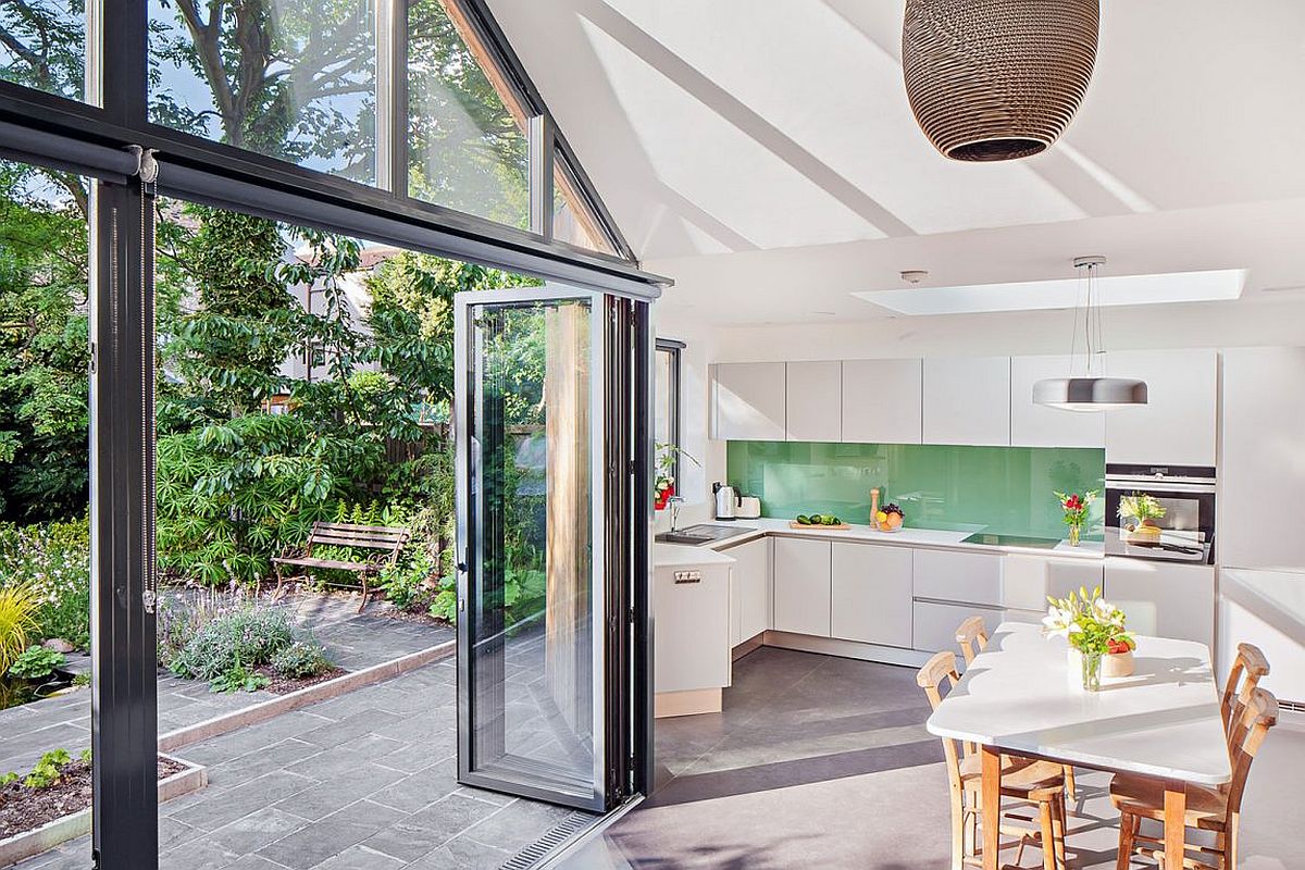 White modern kitchen with a green backsplash