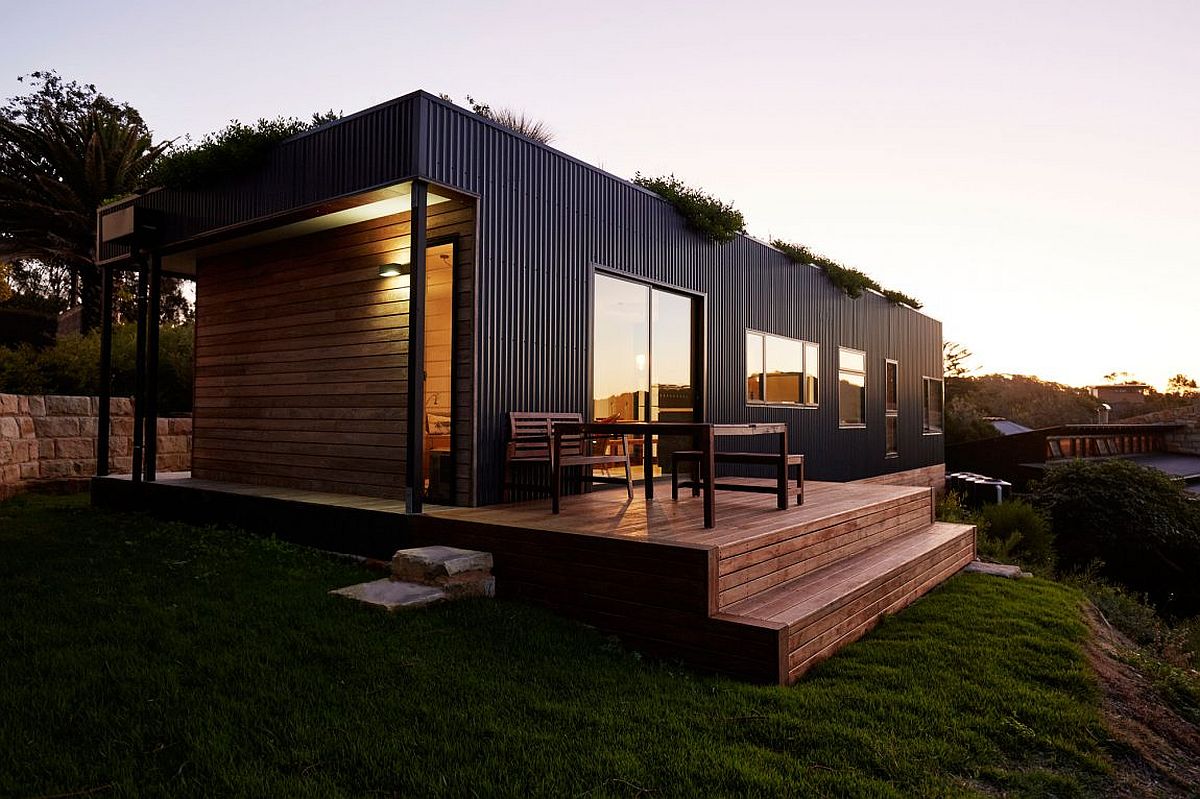 Wooden deck outside the modular home with ocean view