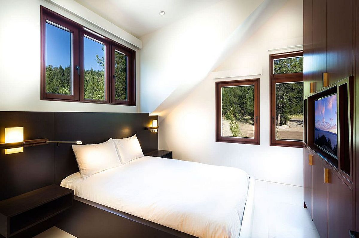 Bedroom of the single family residence with built-in wardrobe and TV