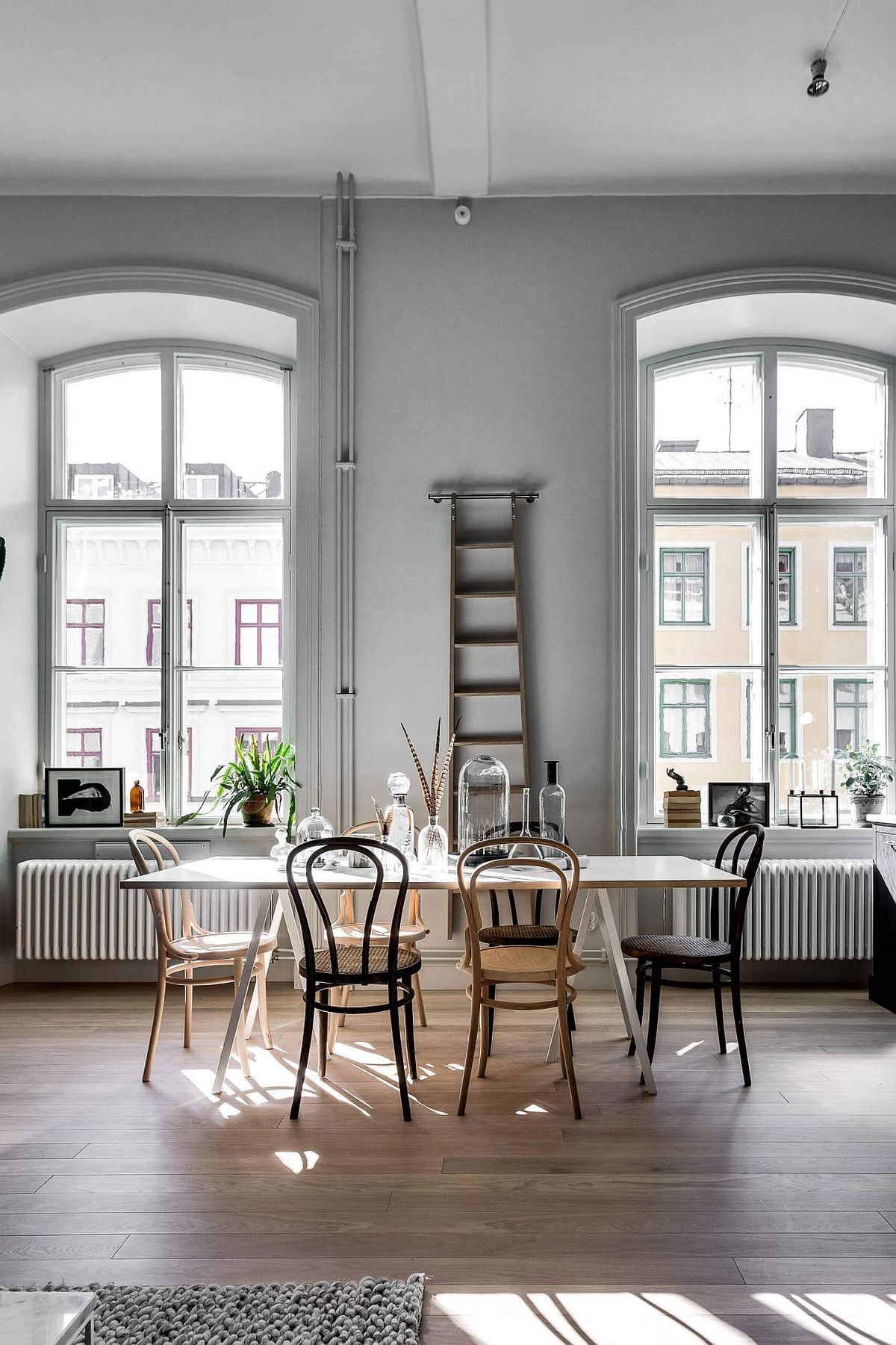 Classic, large windows bring ample natural light into the apartment