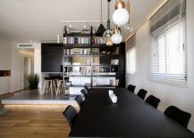 Combination-of-contrasting-pendant-lights-above-the-dining-table-217x155