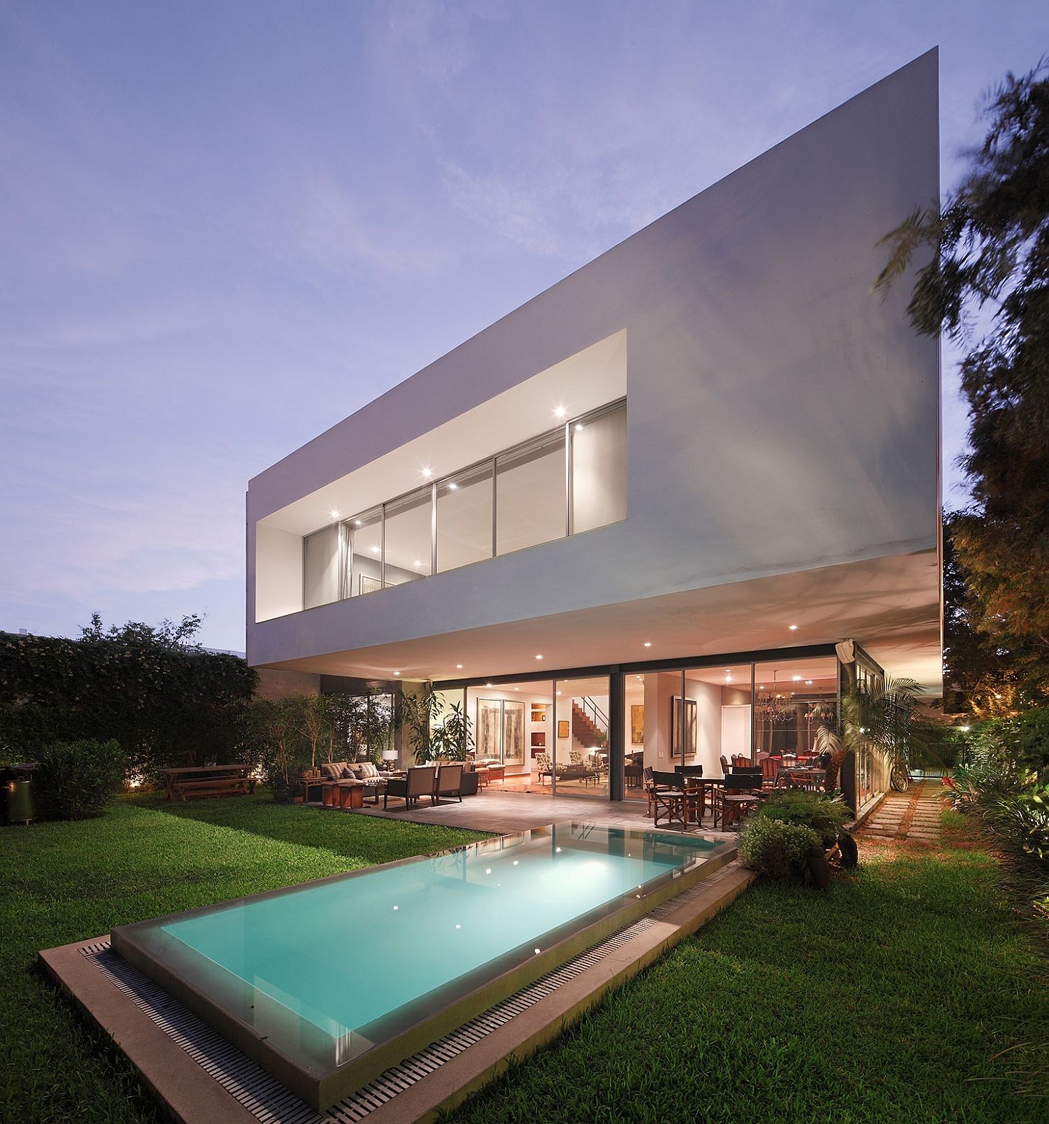 Contemporary House M in Lima with a relaxing pool in the backyard