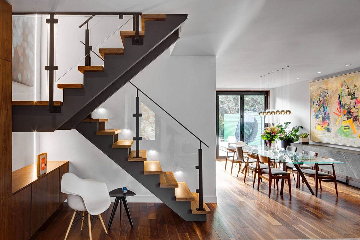 Contemporary-staircase-connects-the-lower-level-with-the-bedrooms-above