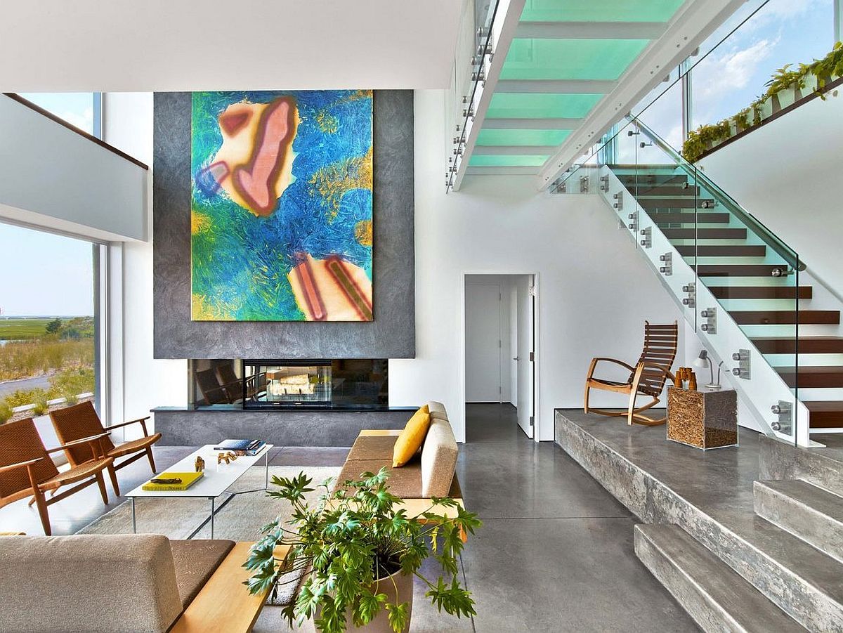 Contemporary staircase with wooden stairs and glass railing