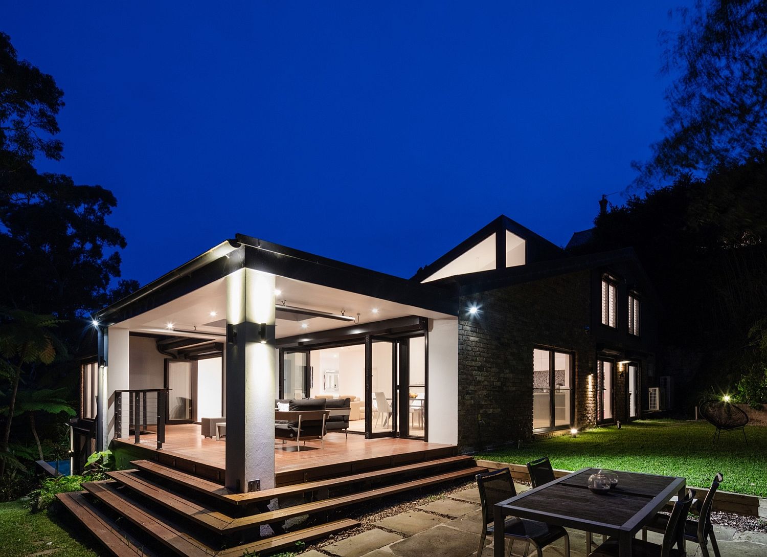 Covered outdoor zone and dining space of the Aussie home