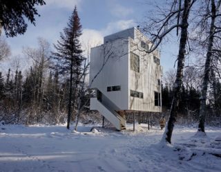 Pole House: an Idyllic Winter Escape That Stands on Recycled Gas Pipes