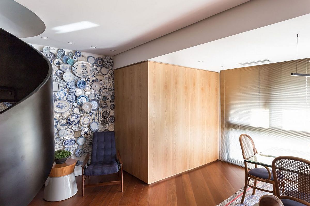 Cozy reading corner next to the cabinets and under the staircase