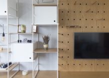 Custom-shelves-and-cabinets-next-to-the-TV-unit-with-mouldar-style-217x155