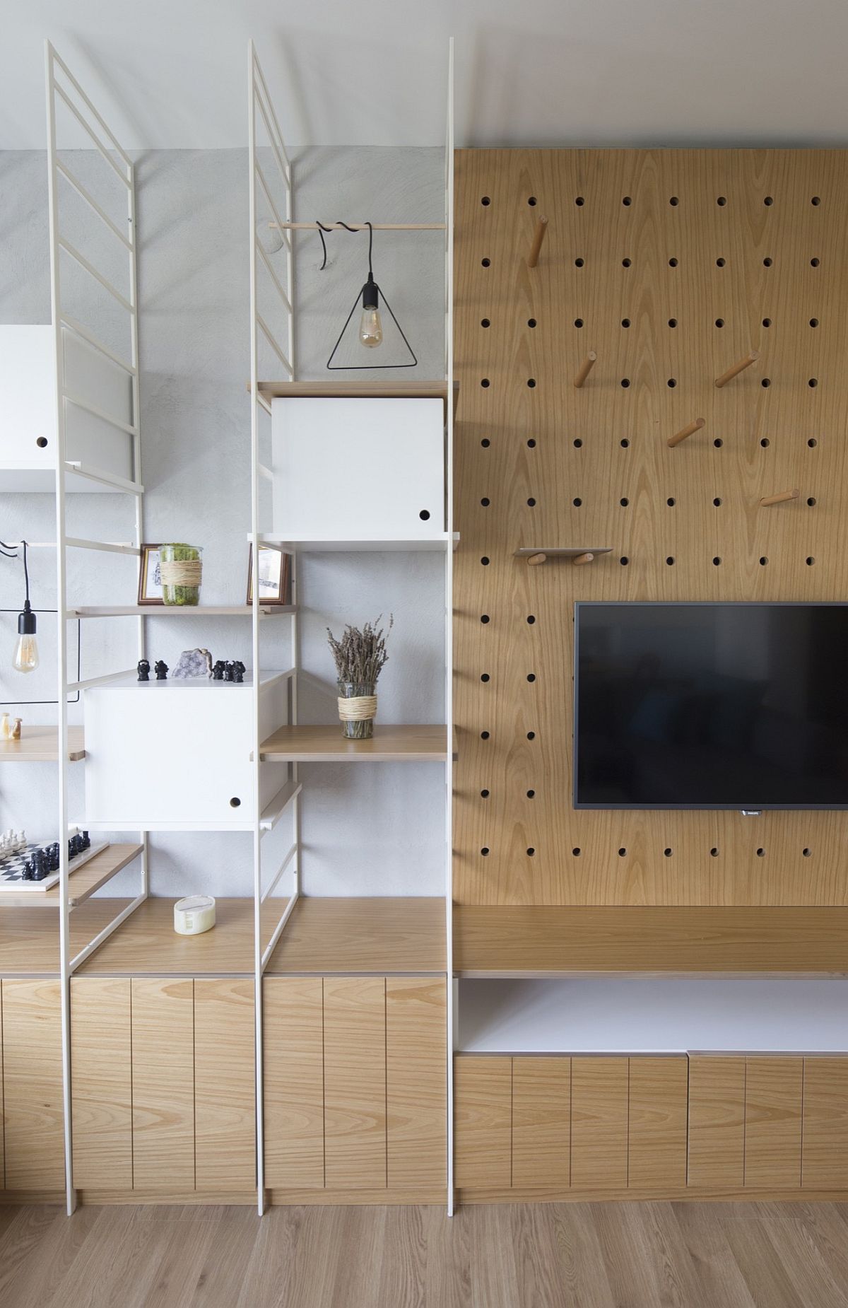 Custom-shelves-and-cabinets-next-to-the-TV-unit-with-mouldar-style