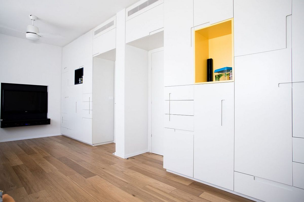 Custom-units-and-built-in-cabinets-give-the-kids-room-a-minimal-look