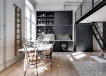 Double-height-kitchen-and-dining-room-of-the-small-Scandinavian-apartment-in-Stockholm-217x155