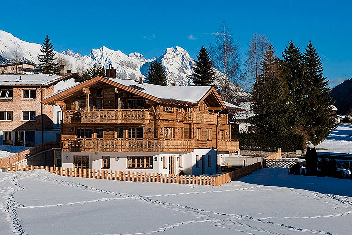 Enjoy-a-holiday-surrounded-by-snow-covered-slopes-and-imposing-Alps-at-Chalet-Austria