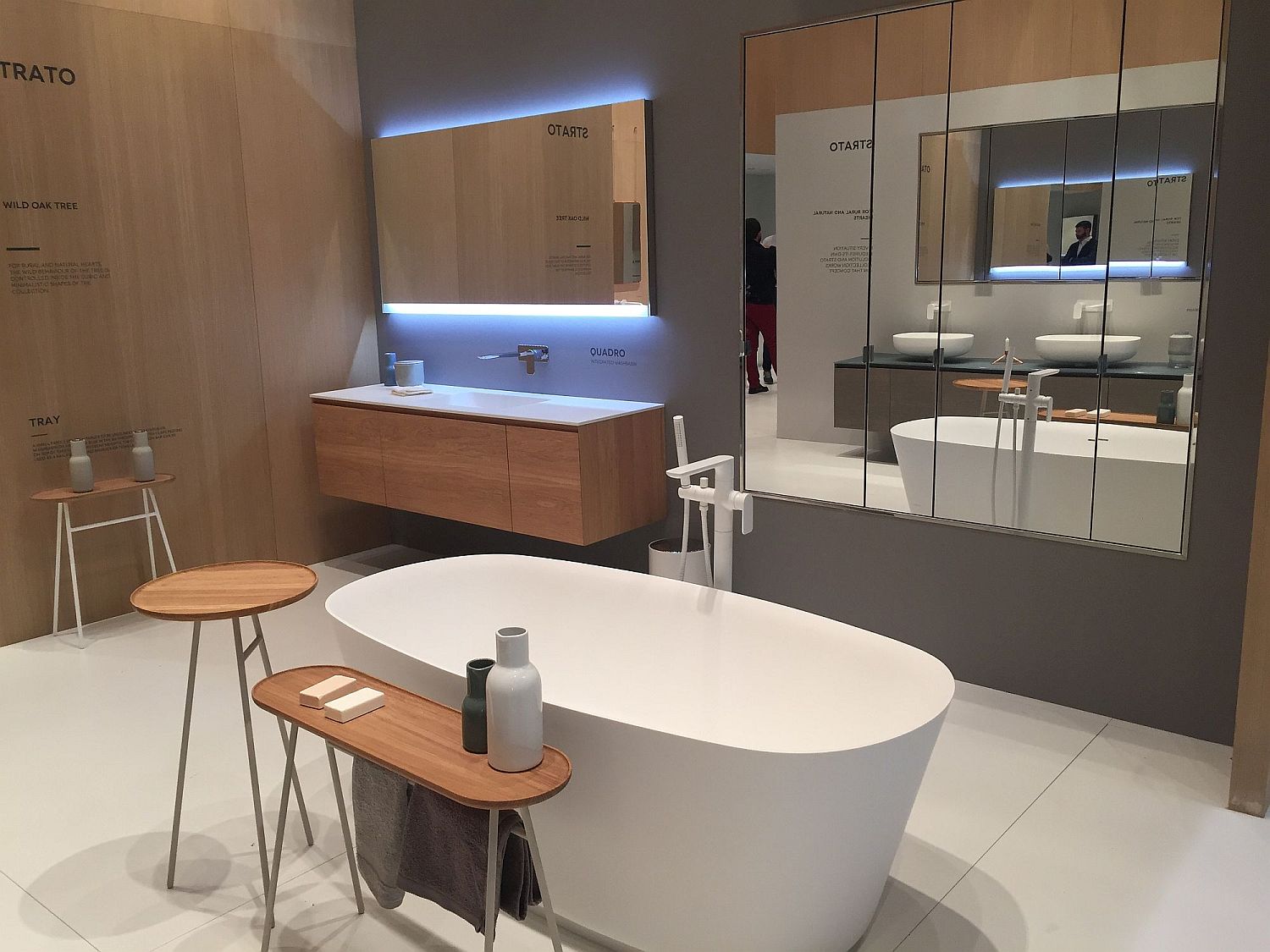 Floating wooden vanity with fabulous lighting and wall -mounted shelves