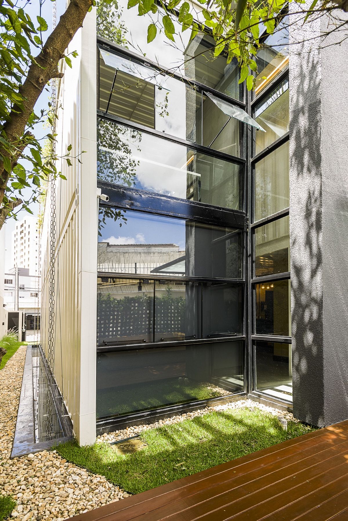 Glass windows bring ample natural light into the invetive office