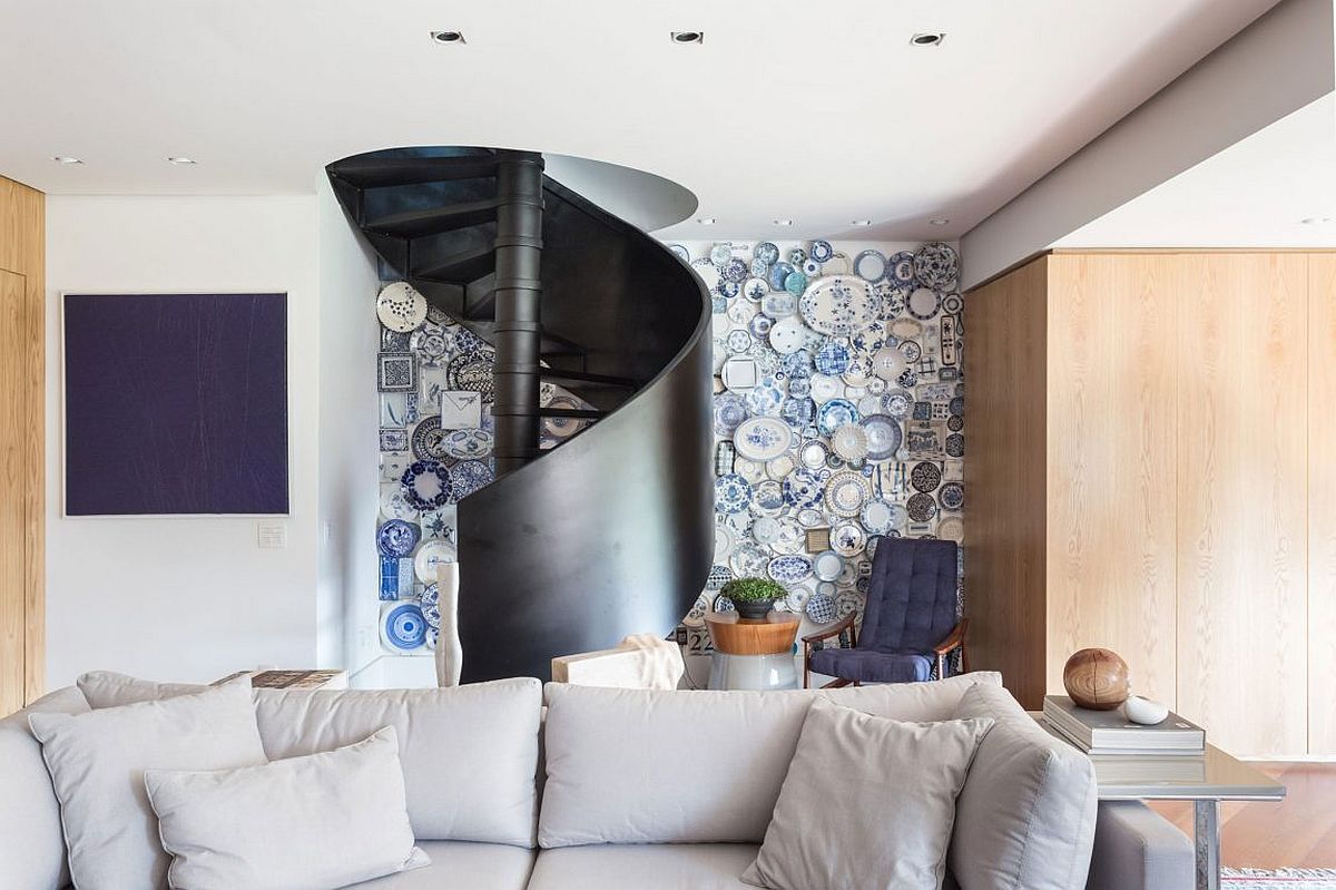 Gorgeous collage of plates creates a dramatic accent wall in the living room