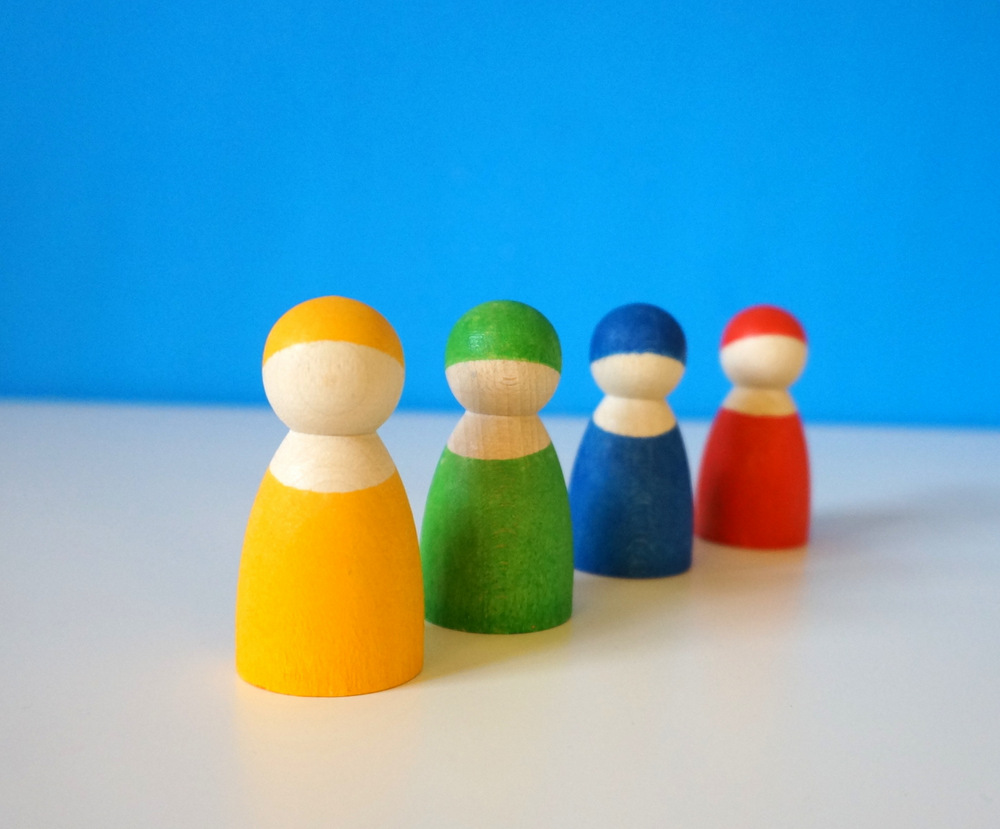 Grimm's Rainbow Peg Dolls are available in a range of colors