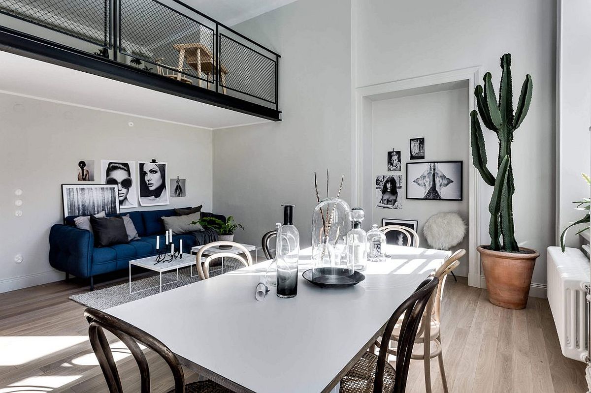 Living area and dining room of the stylish apartment in Stockholm