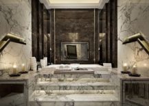 Large bathroom with marble floor and walls, flanked by dark walls.