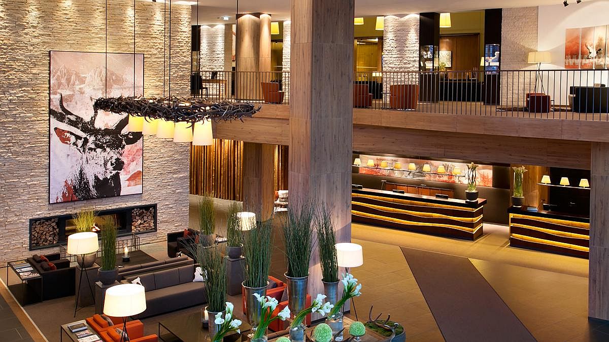 Old world charm meets modern luxury inside the lobby of Kempinski Hotel Das Tirol