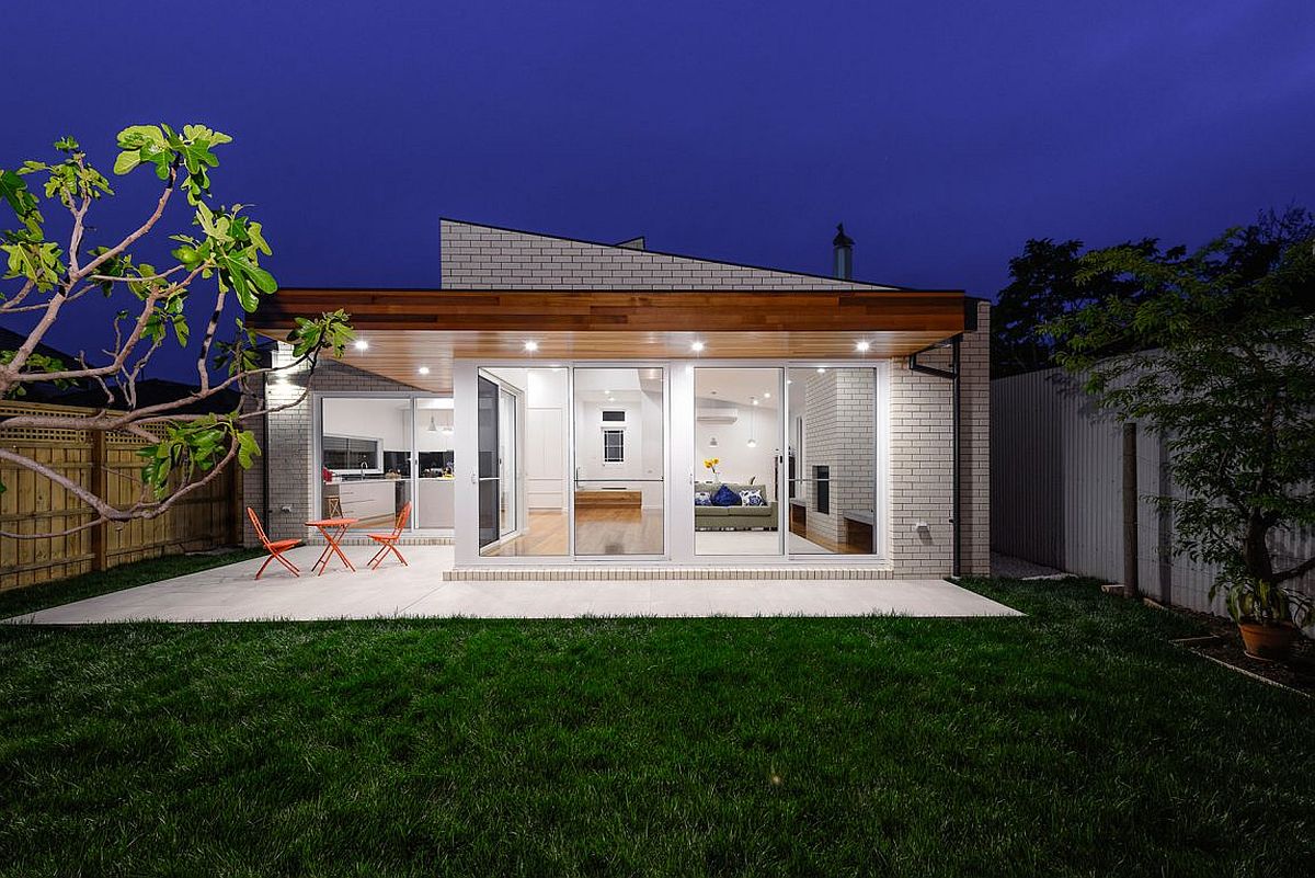 Recessed-lighting-illuminates-the-deck-and-the-garden-after-sunset