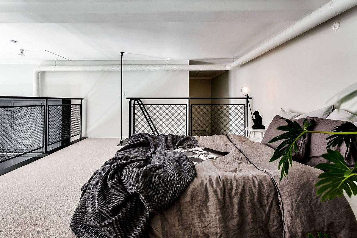 Scandinavian-style-mezzanine-level-bedroom-is-a-space-saver