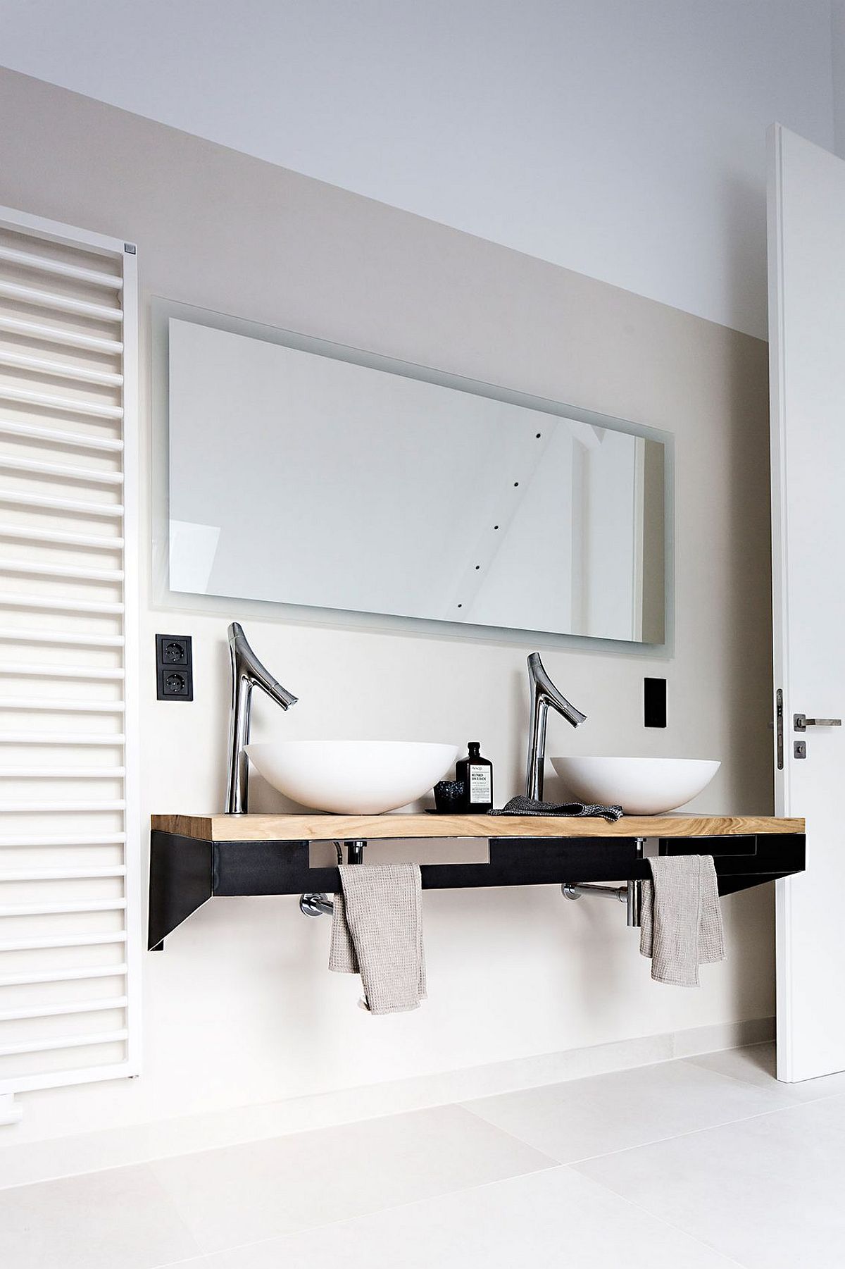 Sleek, flaoting bathroom vaity with wooden top