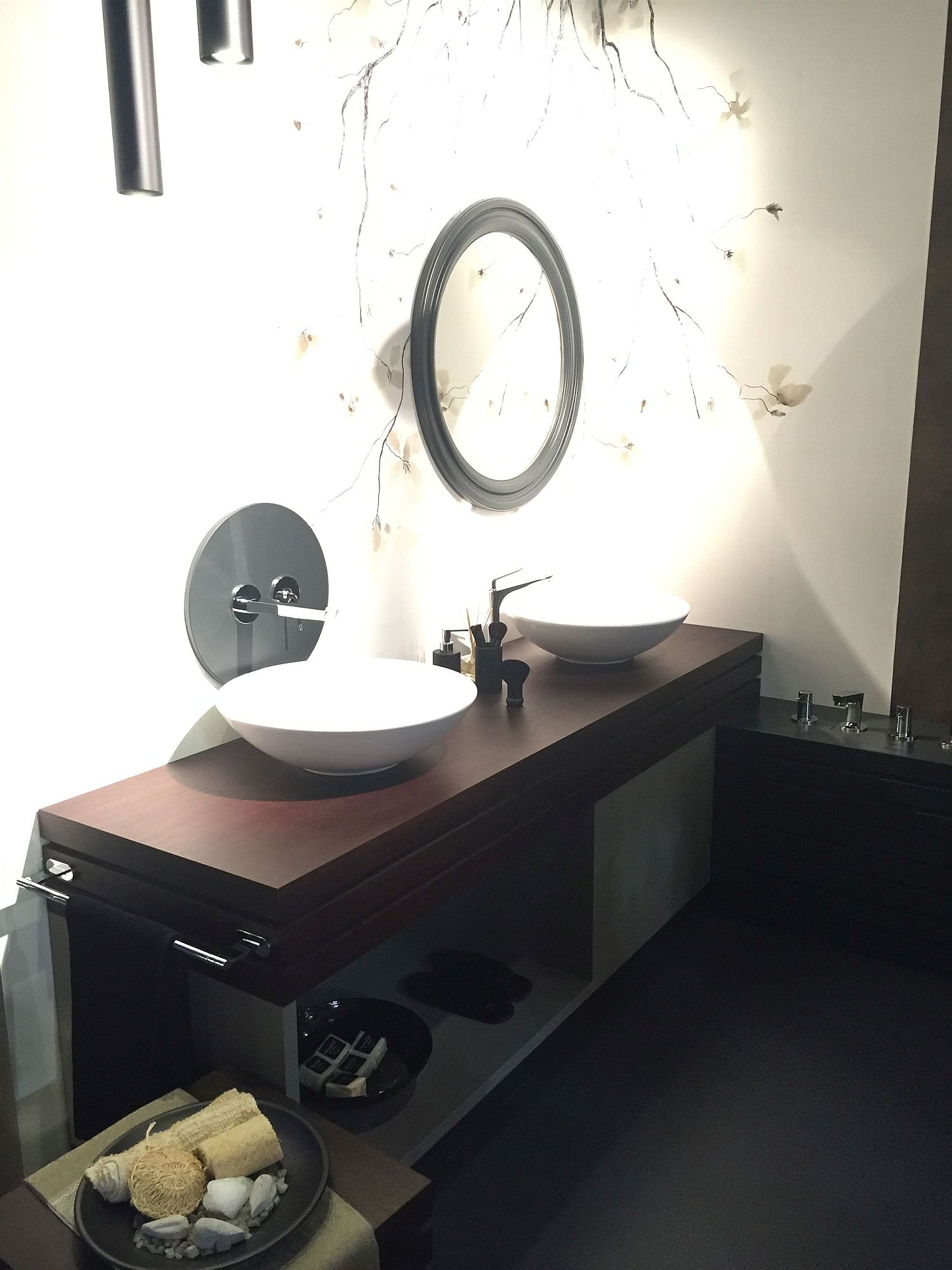 Smart bathroom vanity design with a bowl sink and storage space underneath