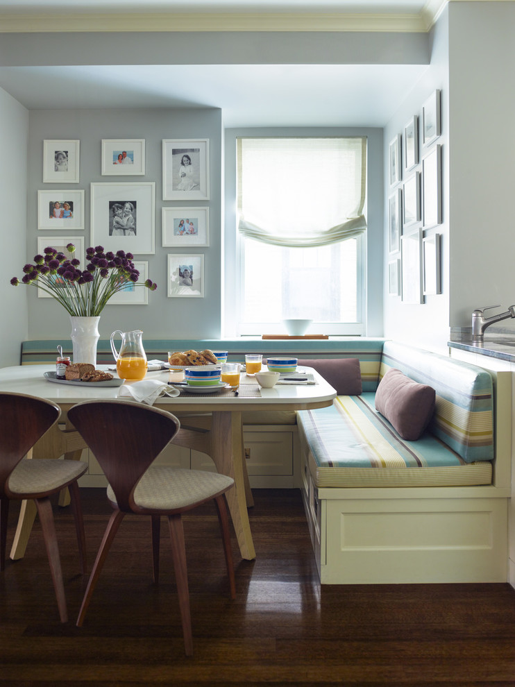 Snug banquette surrounded by family photos