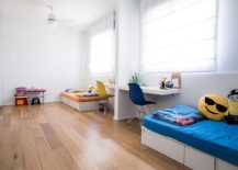 Space-savvy-kids-room-design-in-white-with-colorful-beds-217x155