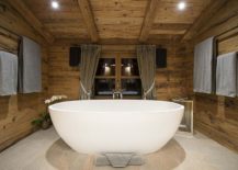 Standlaone-bathtub-in-white-inside-the-bathroom-with-cozy-bathroom-217x155
