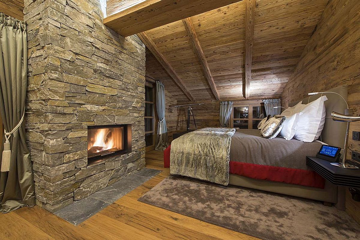 Stone fireplace of the chalet bedroom