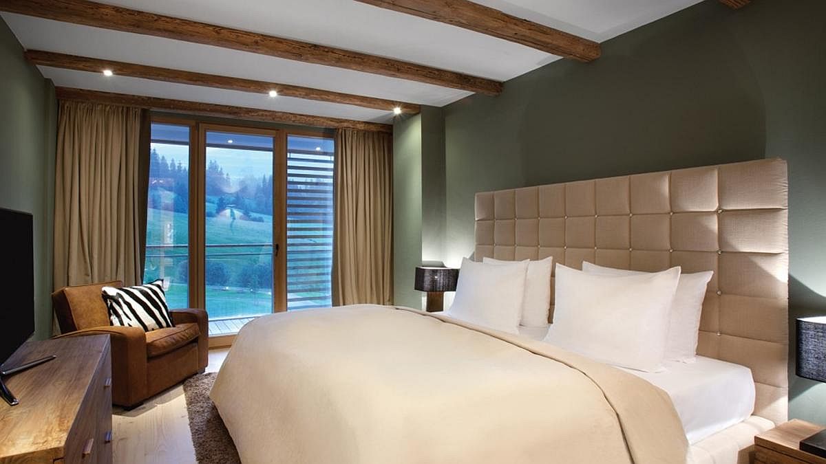 Suite bedroom at Kempinski Hotel Das Tirol