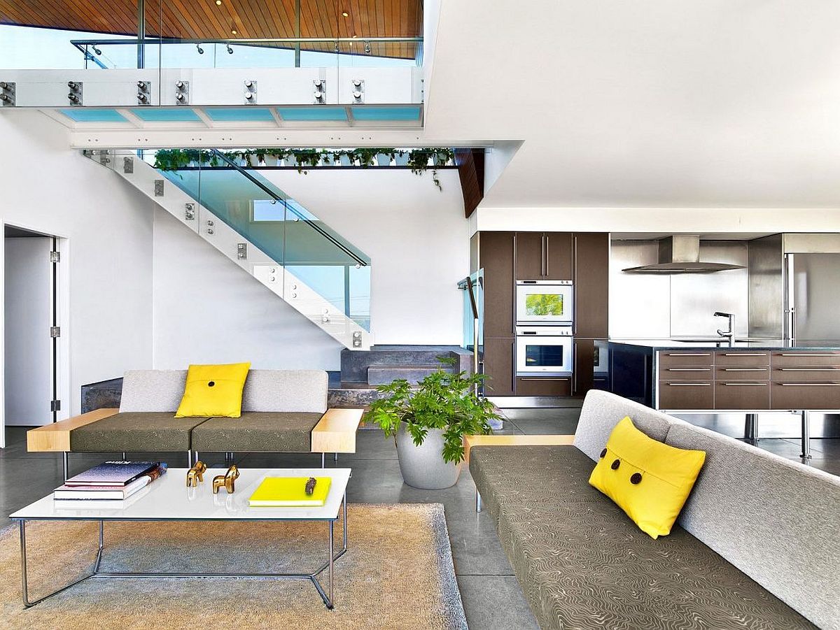 Throw pillows add a pop of yellow to the living area