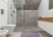 Tiles-define-the-shower-area-of-the-modern-bathroom-217x155