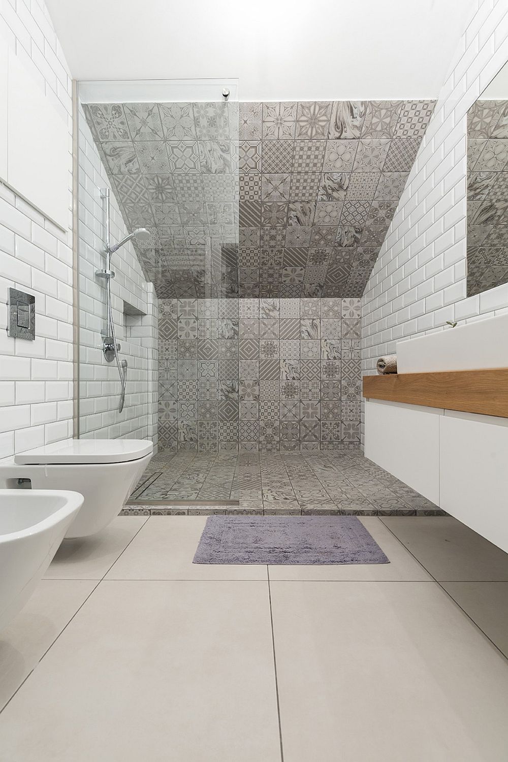 Tiles define the shower area of the modern bathroom