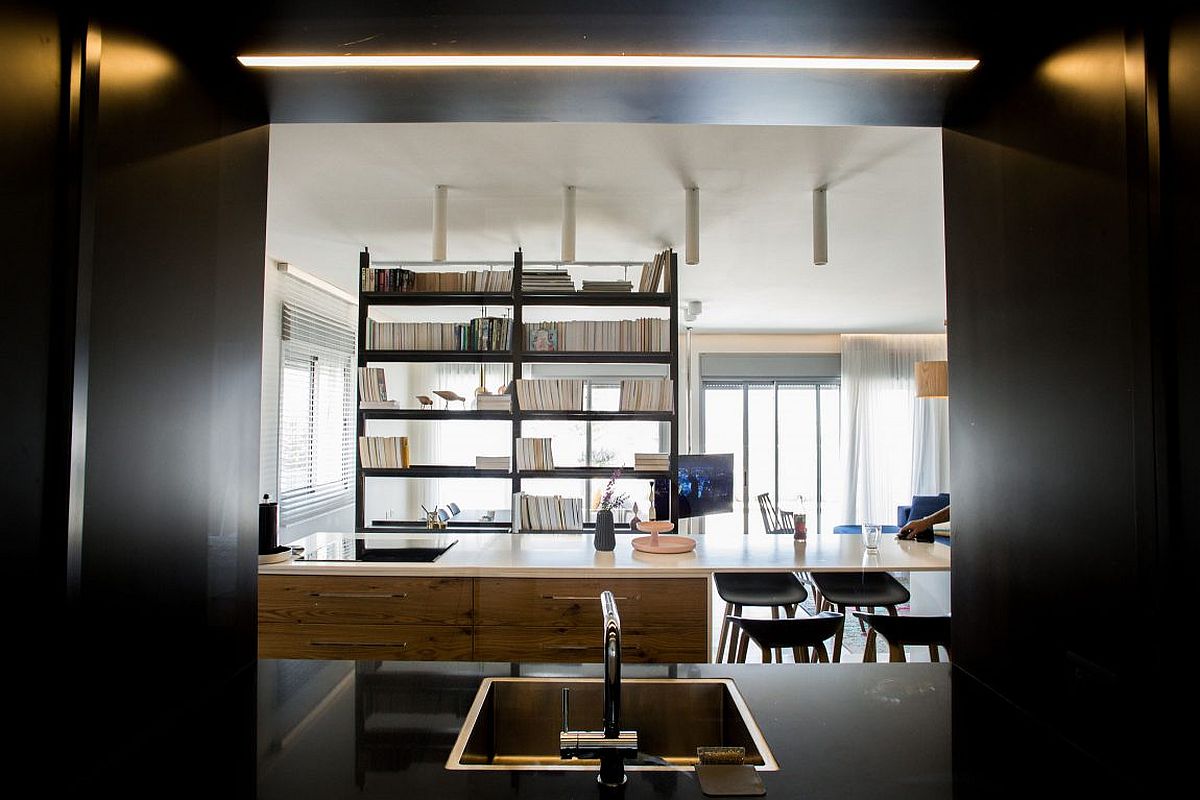 View of the living area from the kitchen on an elevated platform