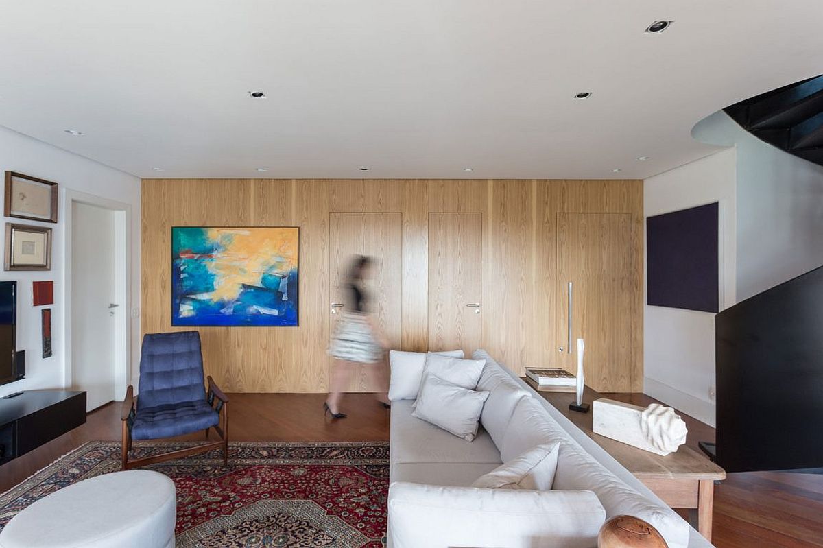 Walls covered in wood add warmth to the interior