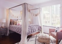 A-cozy-bohemian-nook-with-white-curtains-around-the-bed-frame--217x155