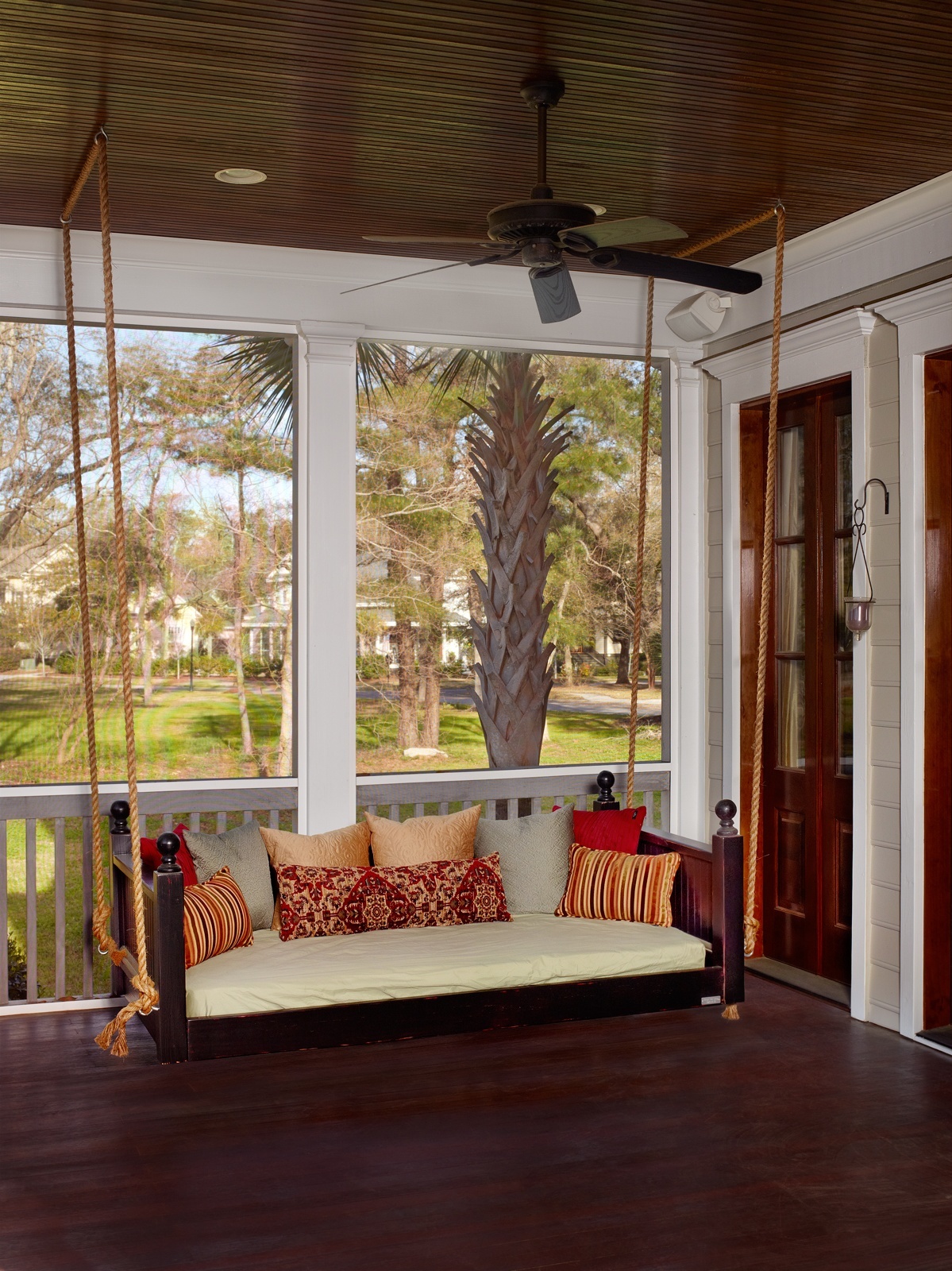 A lively porch swing that immediately draws attention to itself